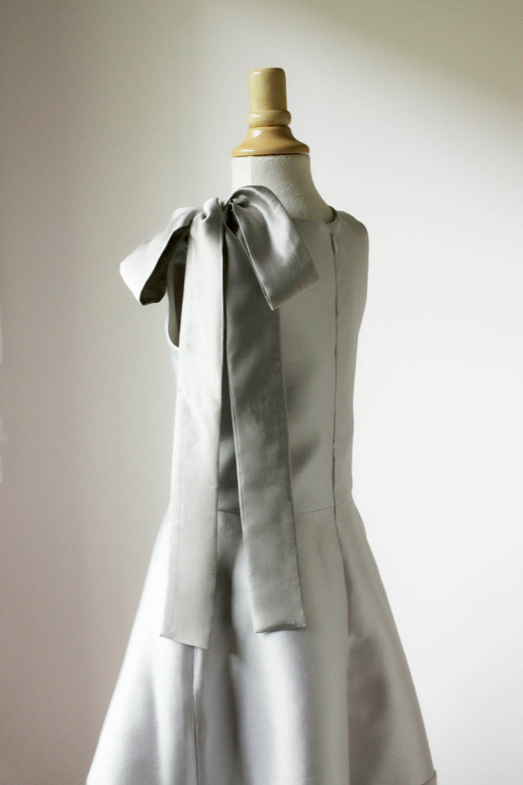 communion dress with bow on shoulder